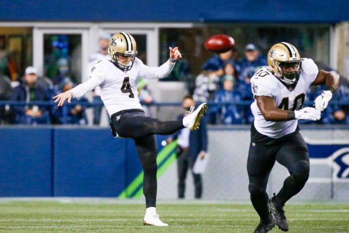 Oct 25, 2021; New Orleans Saints punter Blake Gillikin (4) punts against the Seattle Seahawks. Mandatory Credit: Joe Nicholson-USA TODAY Sports